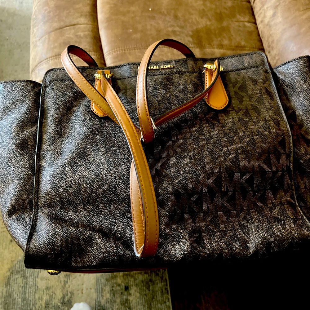 MK purse, the other two (teal and brown) are Fossil brand